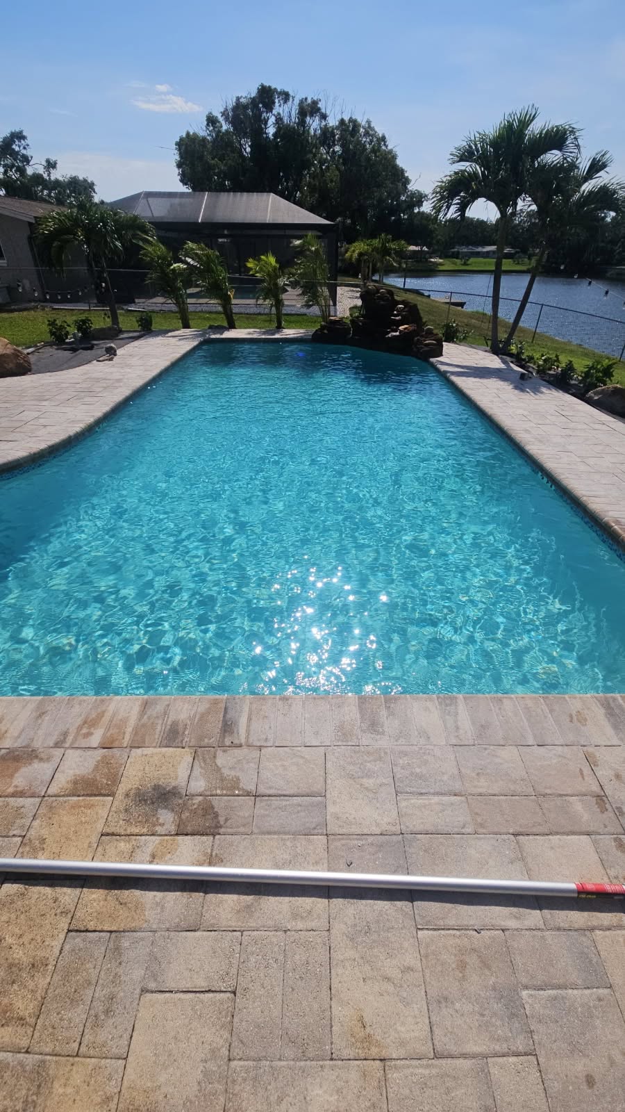 Lakefront Florida pool freshly cleaned